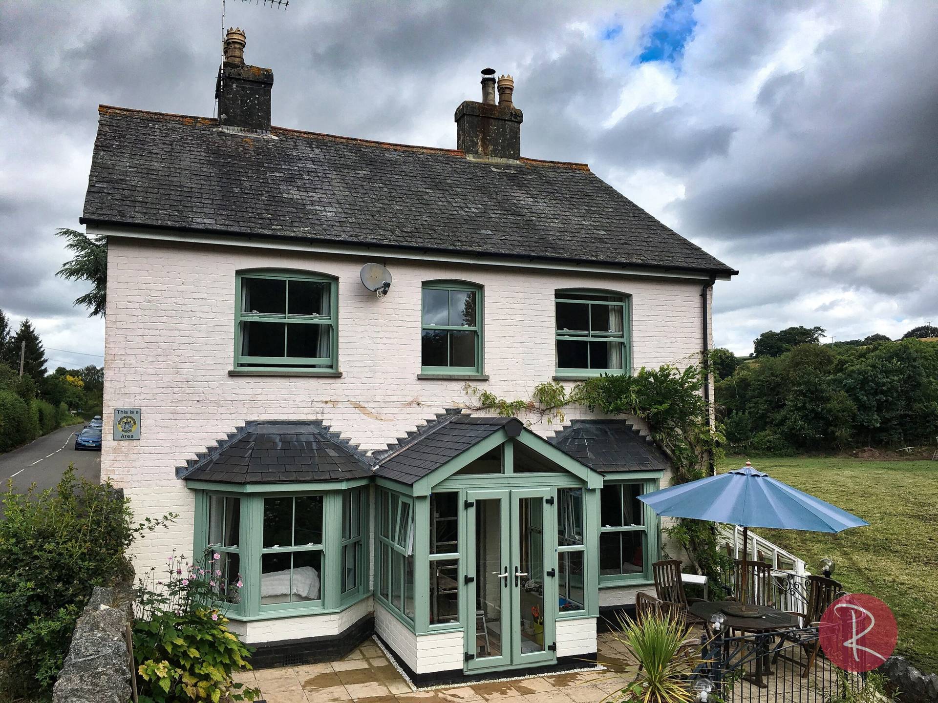 house with chartwell green sash windows