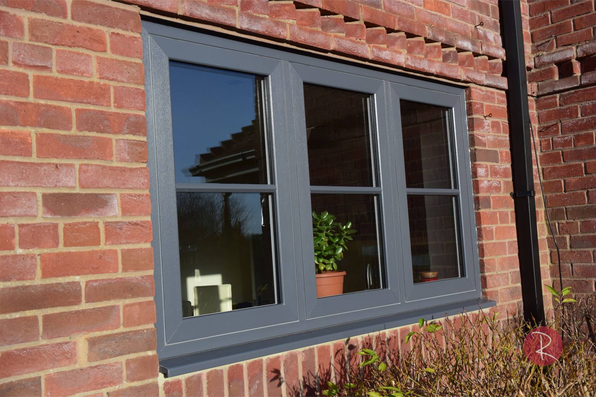 Dark grey triple flush sash windows