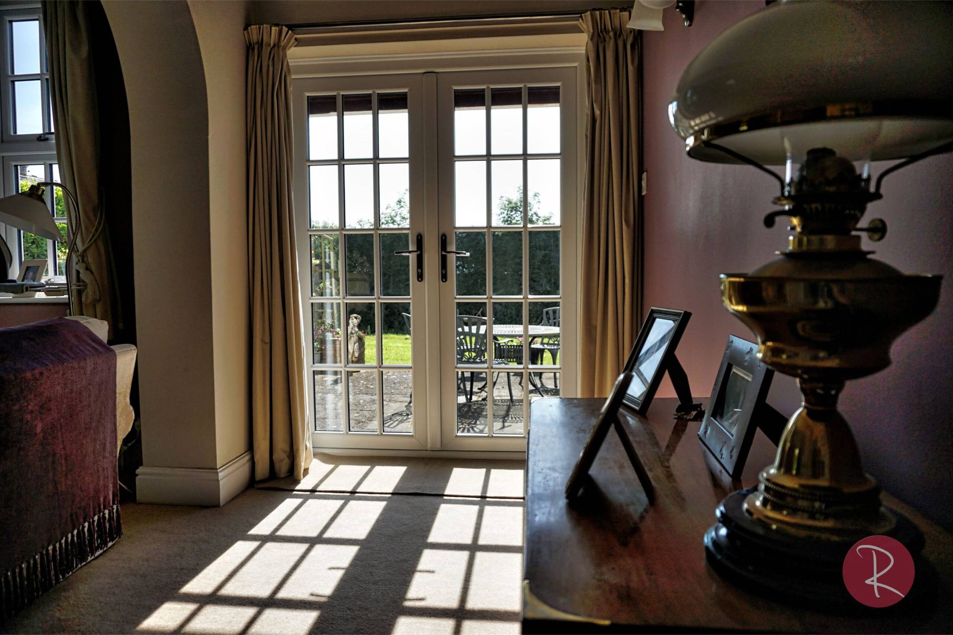 White PVCu French doors with astragal bars