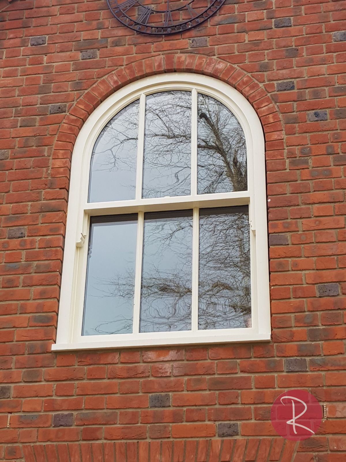 PVCu arched sliding sash window