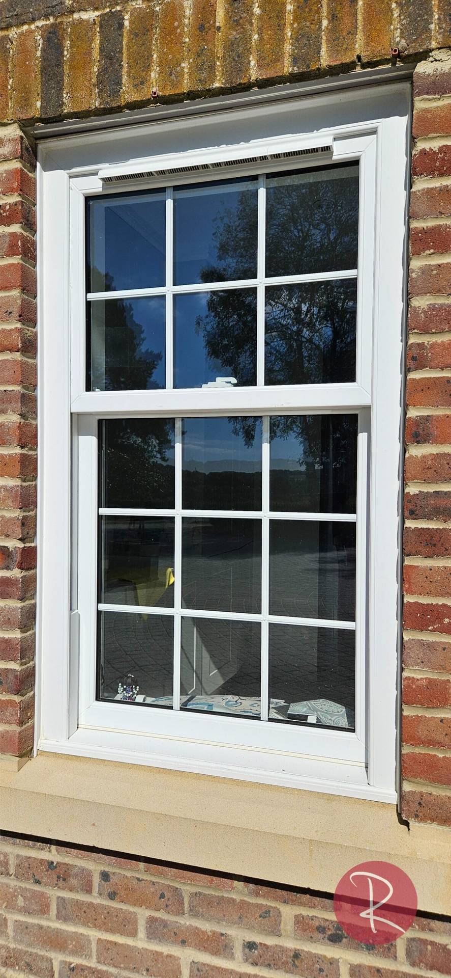 white PVCu vertical sliders