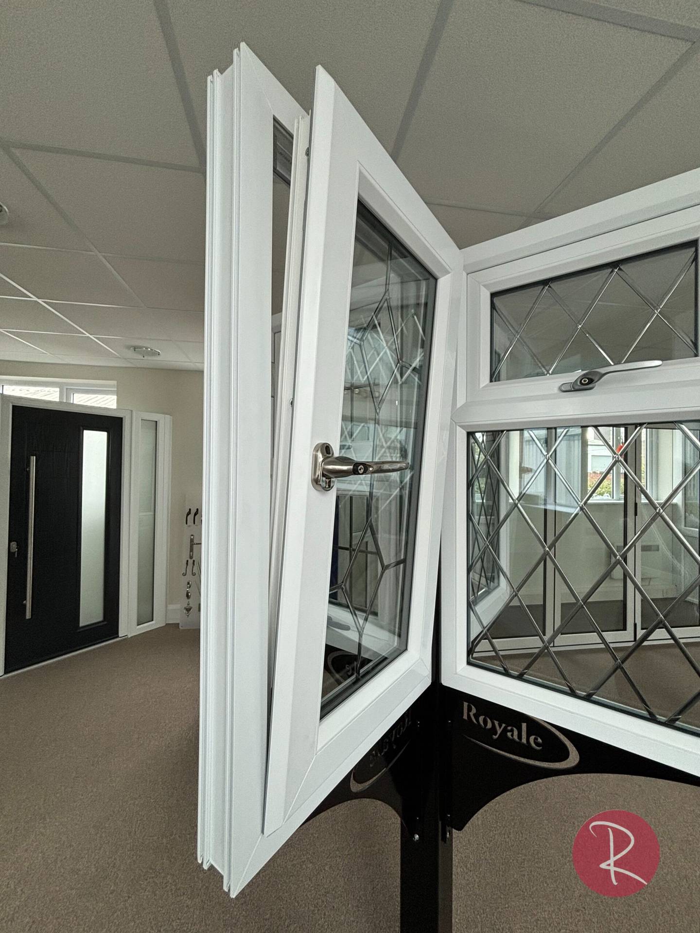 Chamfered white PVCu windows in showroom display