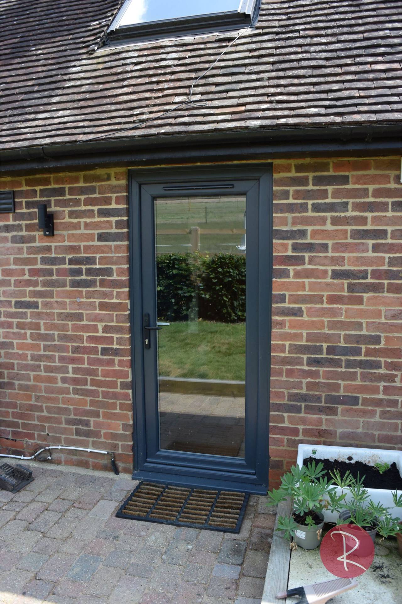 black aluminium double glazed residential door